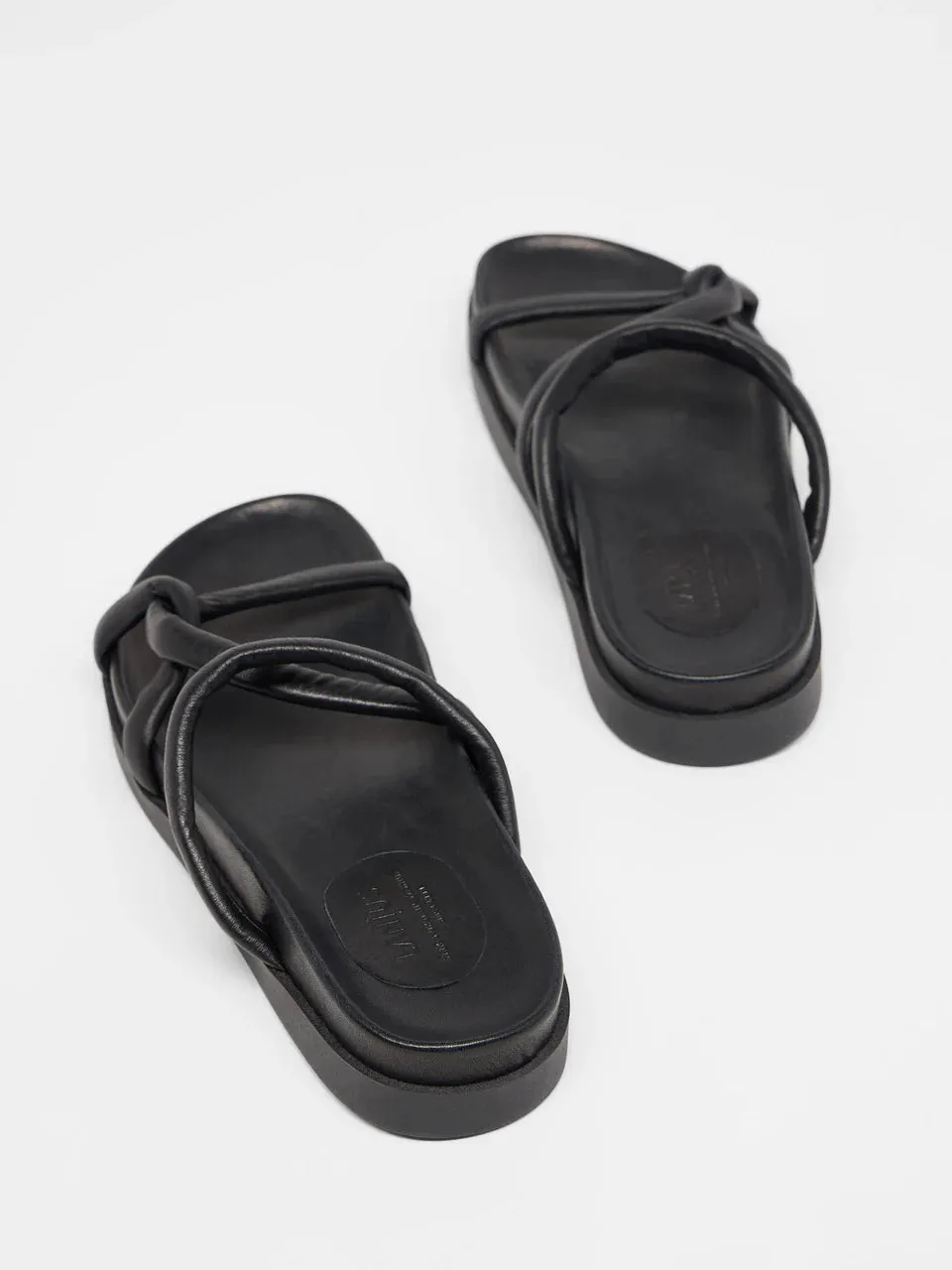 strap mules in black