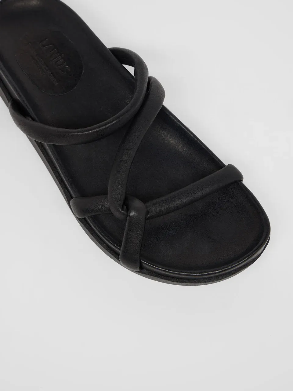 strap mules in black